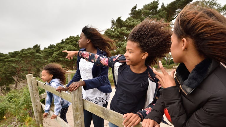 Windswept visitors on Brownsea Island, Poole Harbour, Dorset
